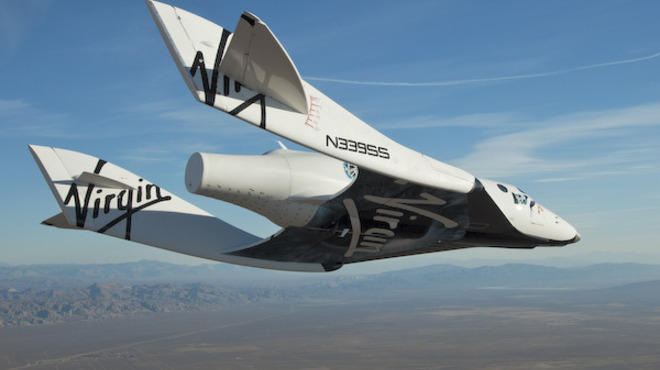 the Virgin Galactic SpaceShip2 (VSS Enterprise) glides toward earth on its first test flight after release from the mothership, "WhiteKnight2" (VMS Eve) over the Mojave, Ca. area early Sunday October 10. The craft was piloted by engineer and test pi...