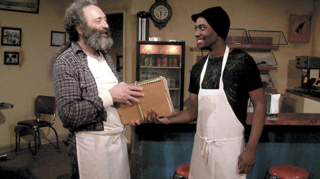Richard Cotovsky and Preston Tate Jr. in Superior Donuts at Mary-Arrchie Theatre Company