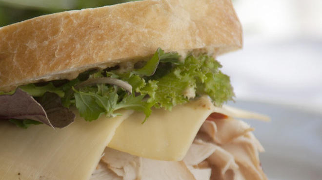 Smoked turkey sandwich with arugula at Wisma