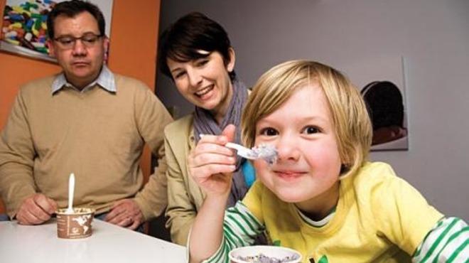 EYES ON THE PRIZE Kids focus on their food at Scooter’s Frozen Custard. COOL KID Five-year-old Elliot Robinson, with her parents Kendra and Jay Robinson, gets an eyeful (and a mouthful) at iCream.