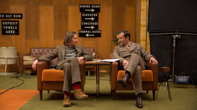 Anderson with Jude Law on the set of The Grand Budapest Hotel