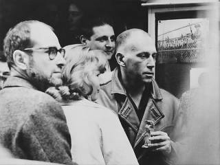 Photograph of Chris Marker (pictured on the right)