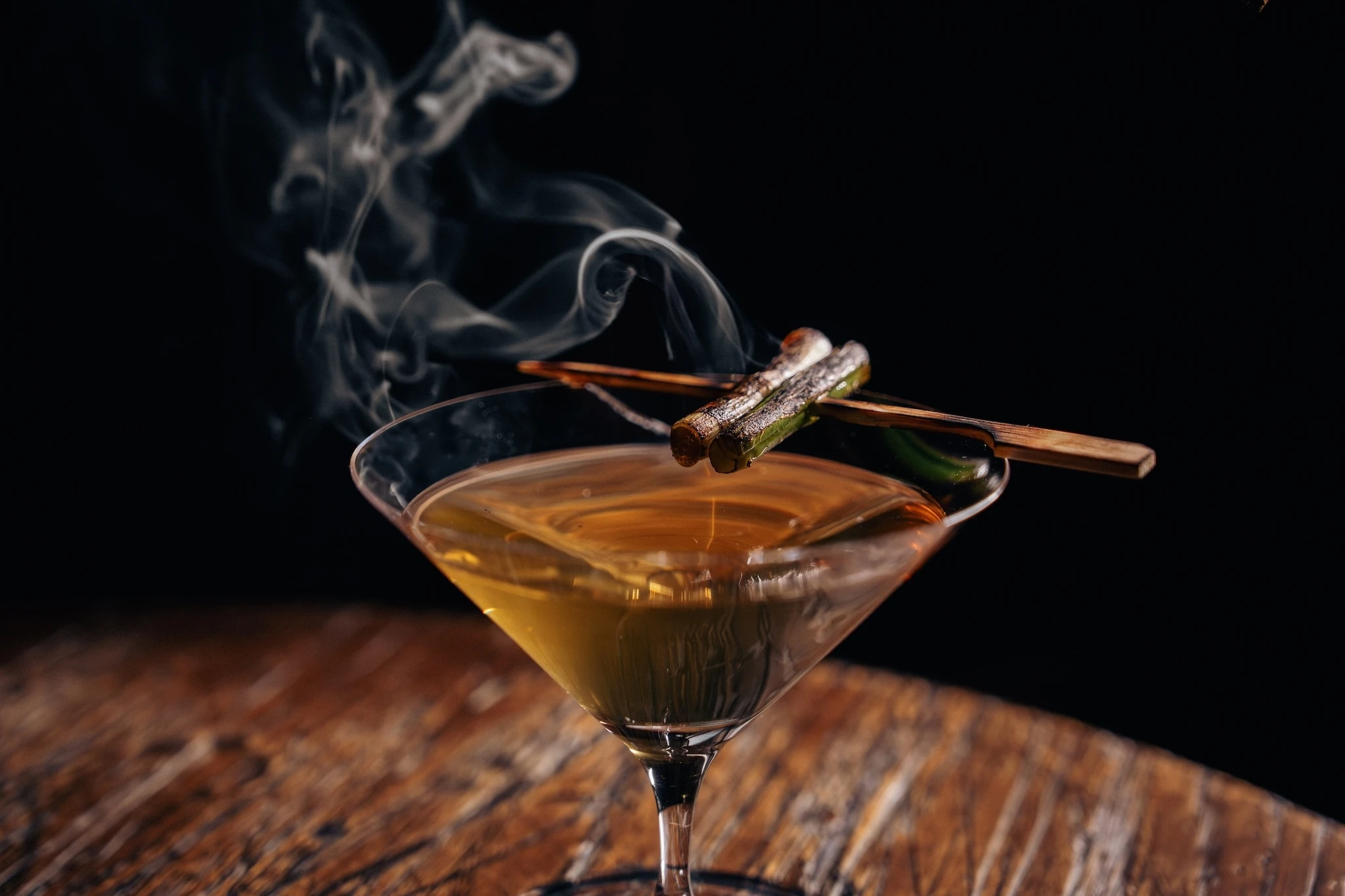Yakitini with a smoking cinnamon stick on top