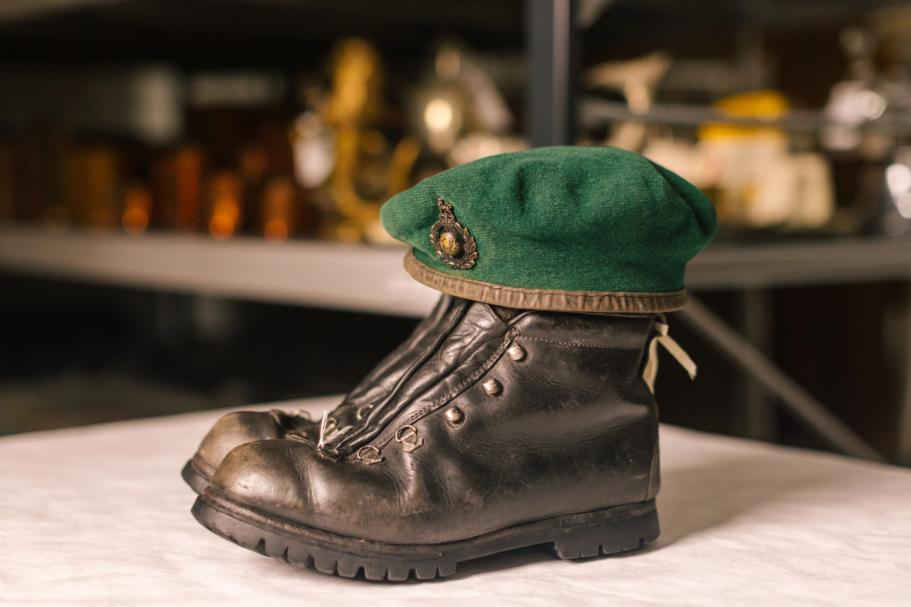 Green beret and boots worn in the Falklands