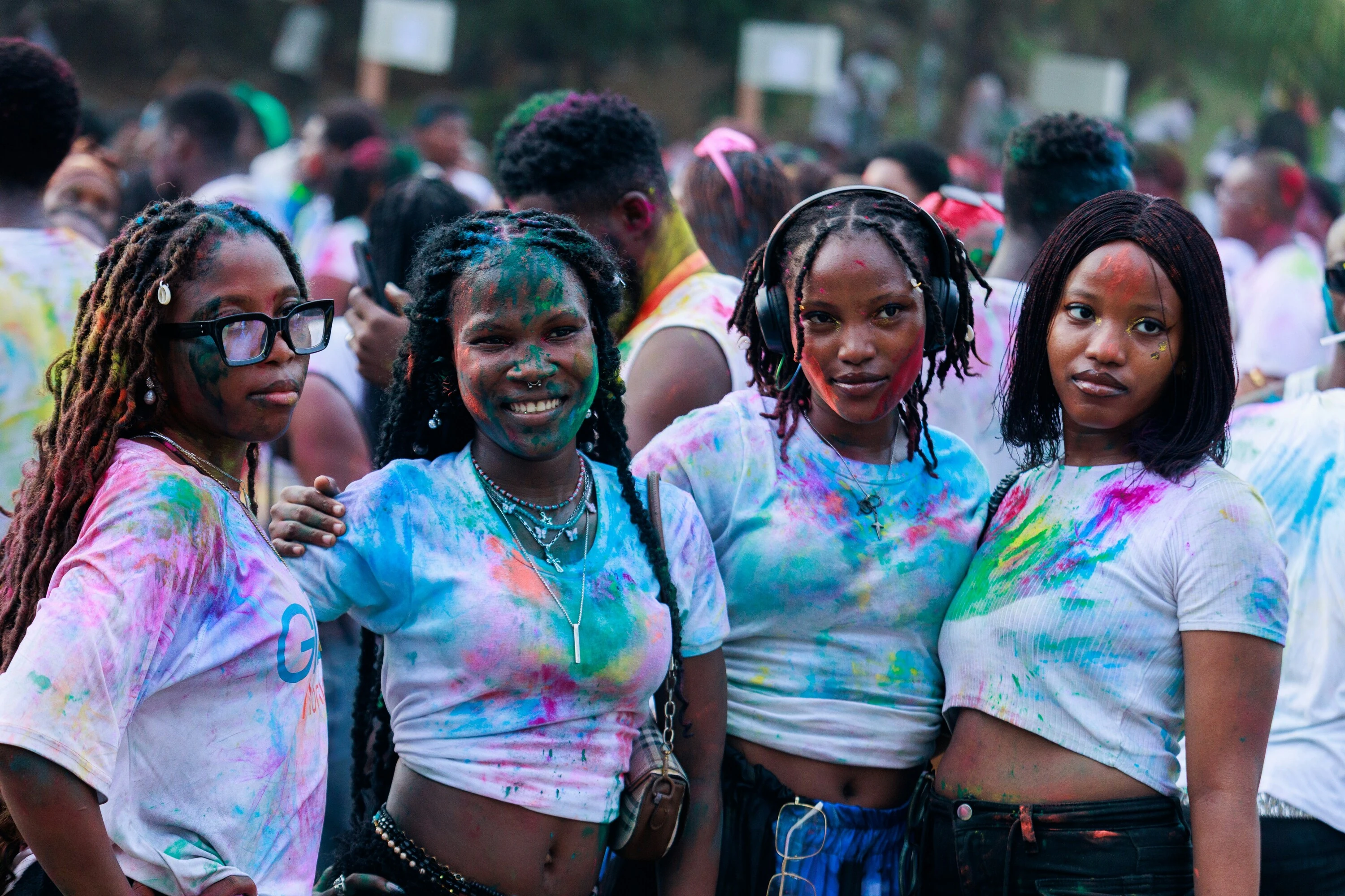 Four women after a colour run 