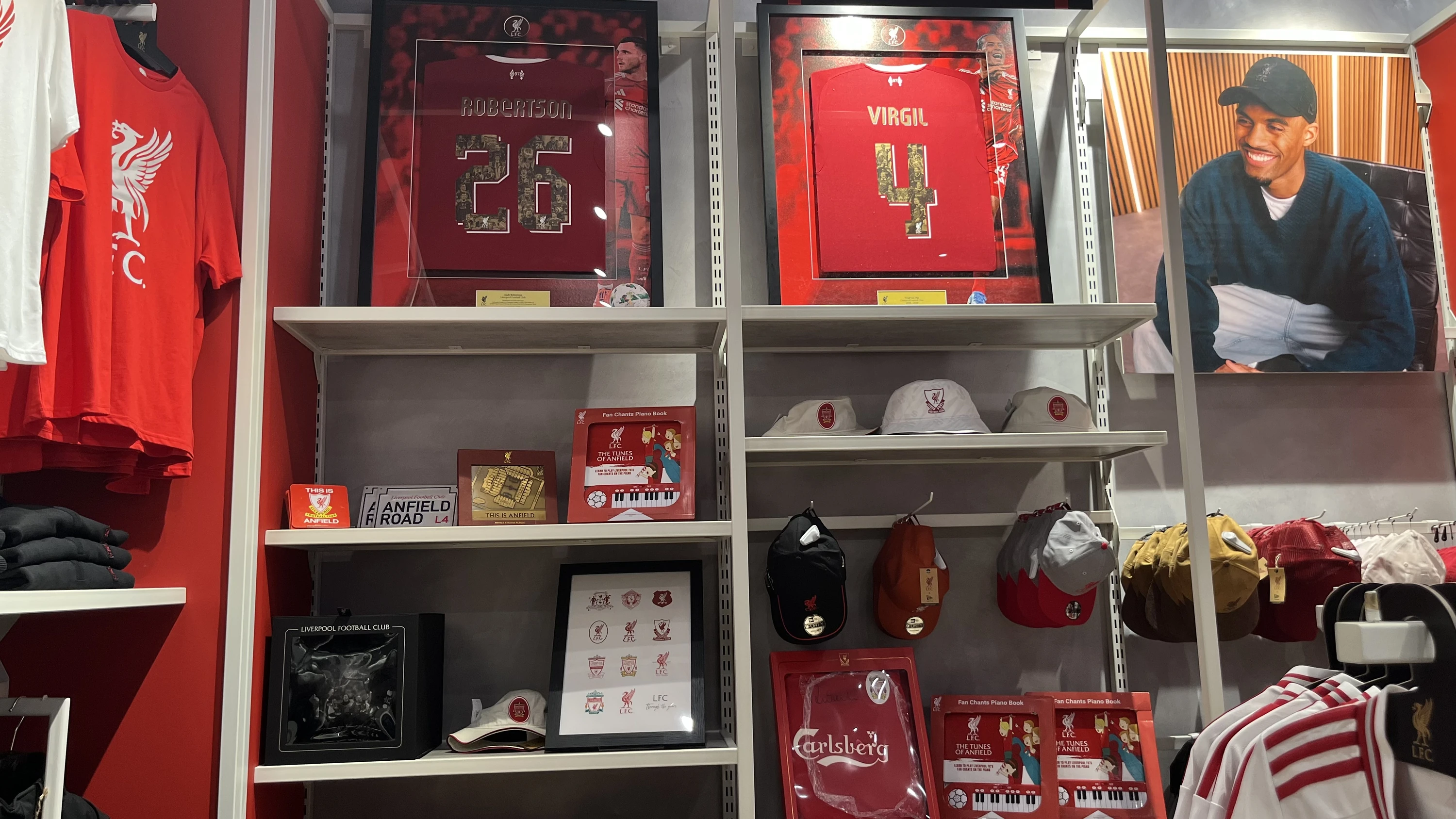 Framed Liverpool shirts, accessories and club memorabilia line the displays at the new Gateway store.