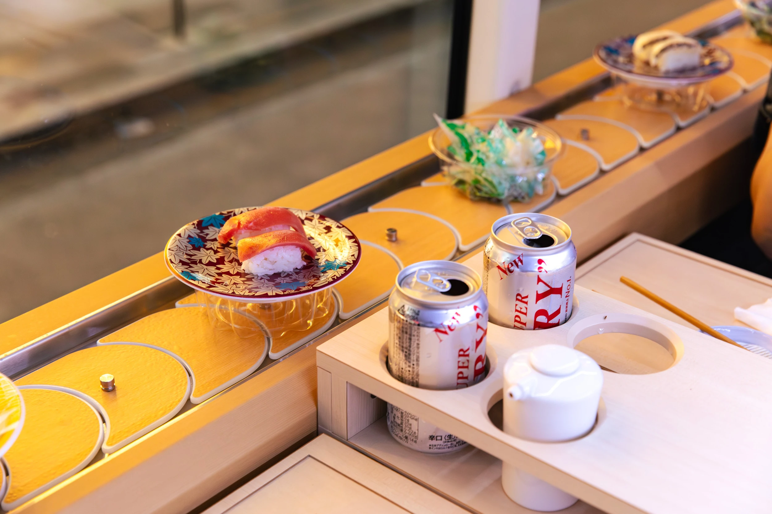 The world&rsquo;s first conveyor-belt sushi bus is finally here, but should you ride it? Here&rsquo;s what we think