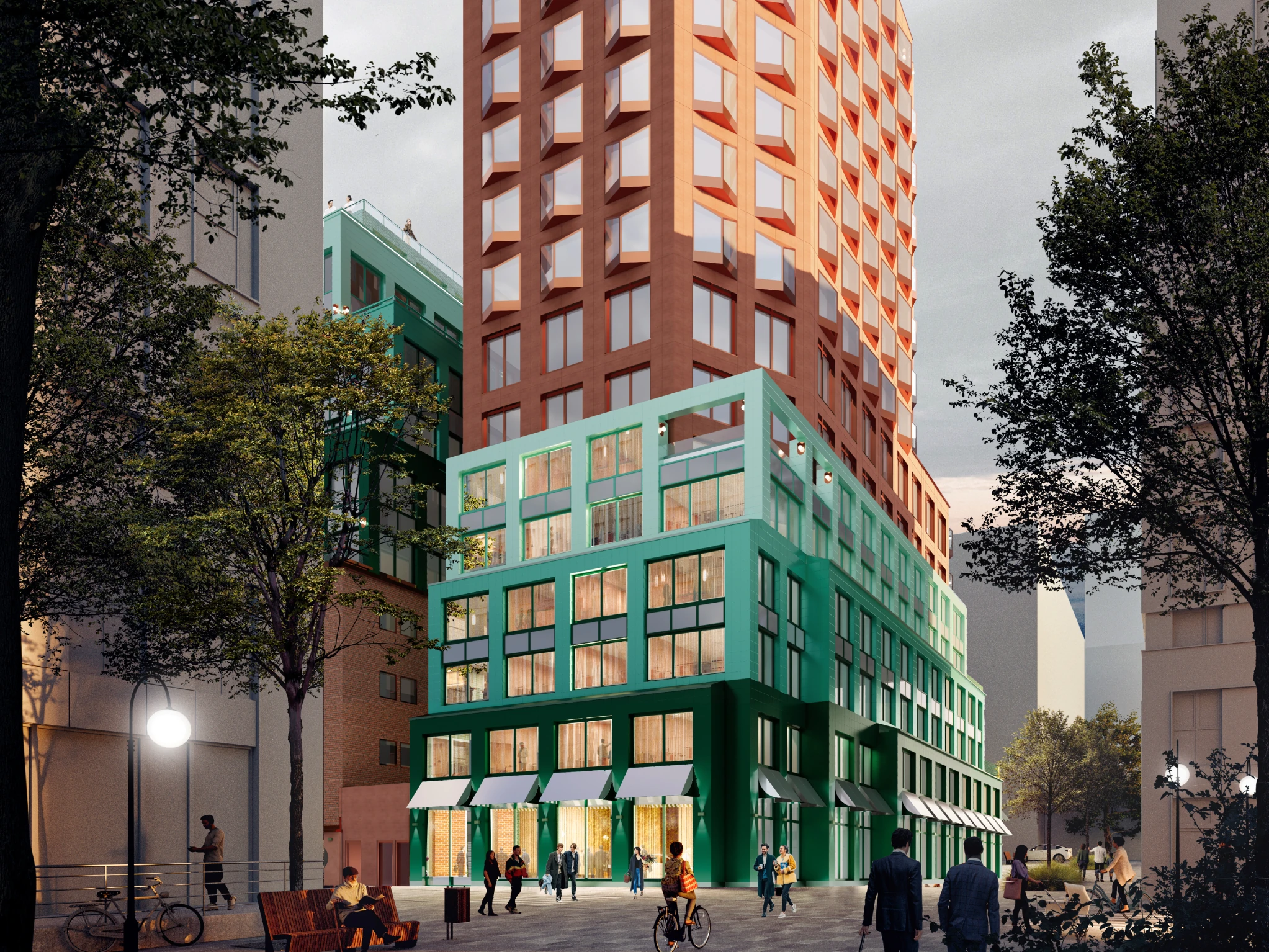 Rendering of Strawberry's planned hotel in Marievik, Stockholm: a green-tiled building in front of a tall terracotta tower, with people on the rooftop terrace and pedestrians on the street at dusk.