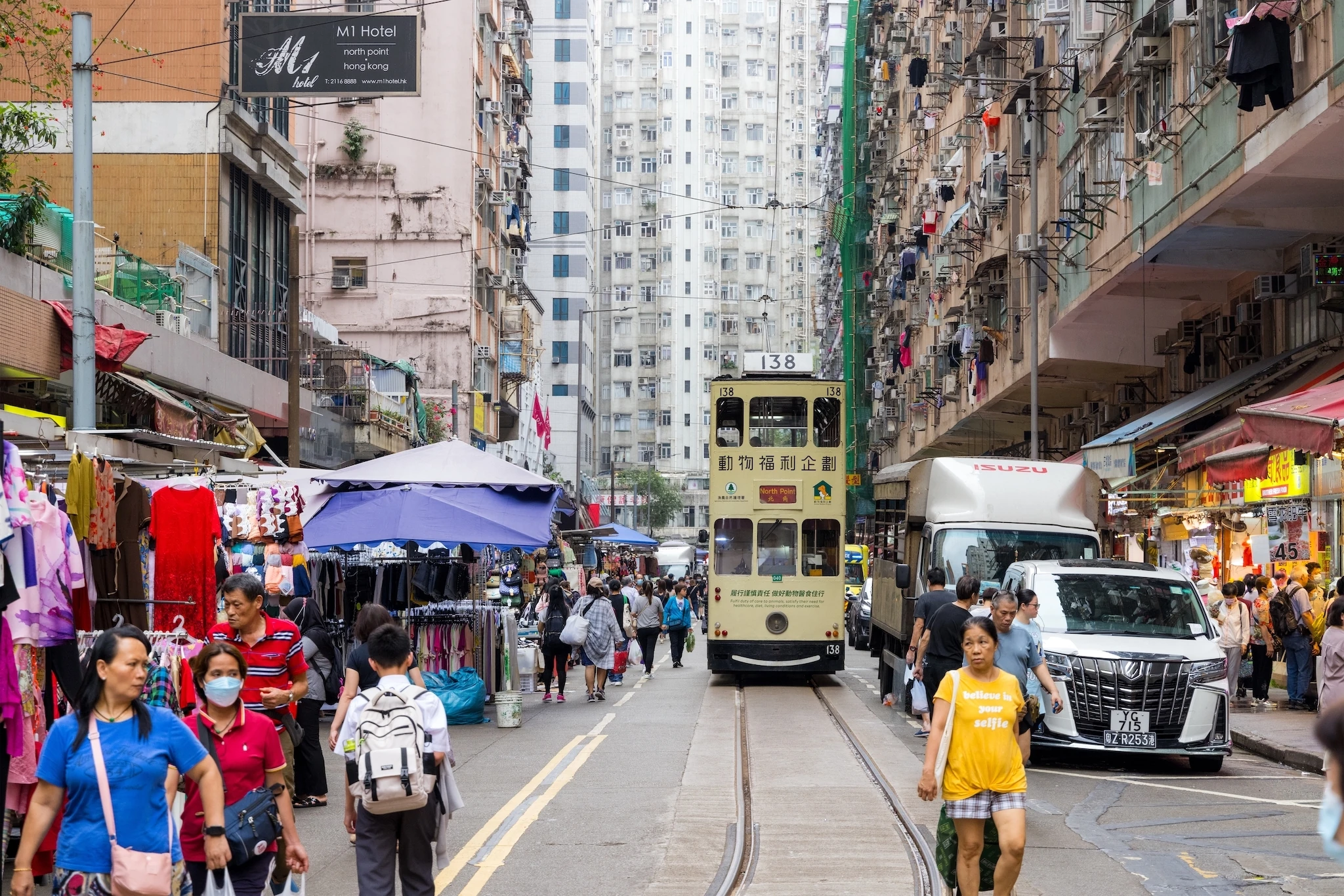 Hong Kong double decker tram on a busy street
