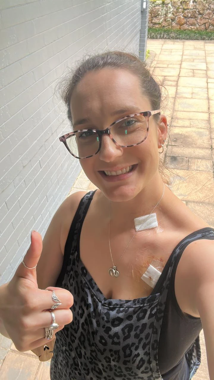 Keeping a positive attitude after her first day of chemotherapy. 