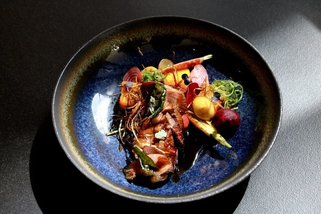 Options for Restaurant Week include Tuna Tataki and Pulled Chicken Bao. 