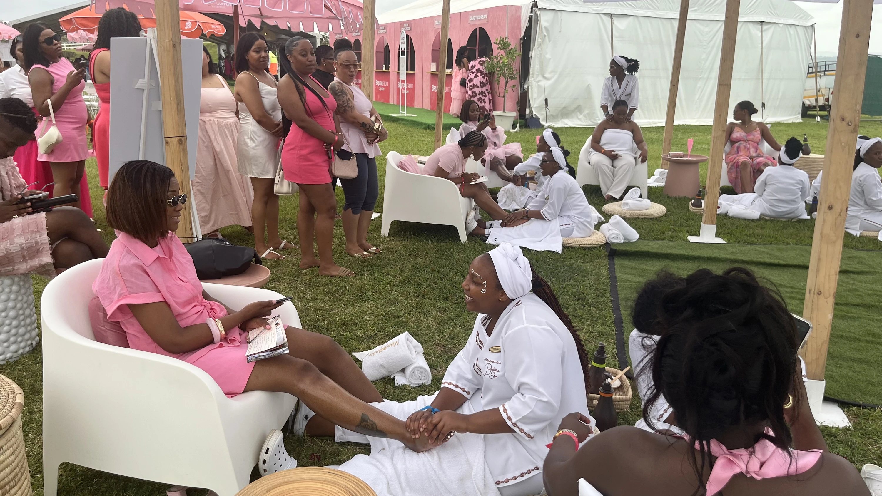 Guests take a break for complimentary massages from Mangwanani therapists.