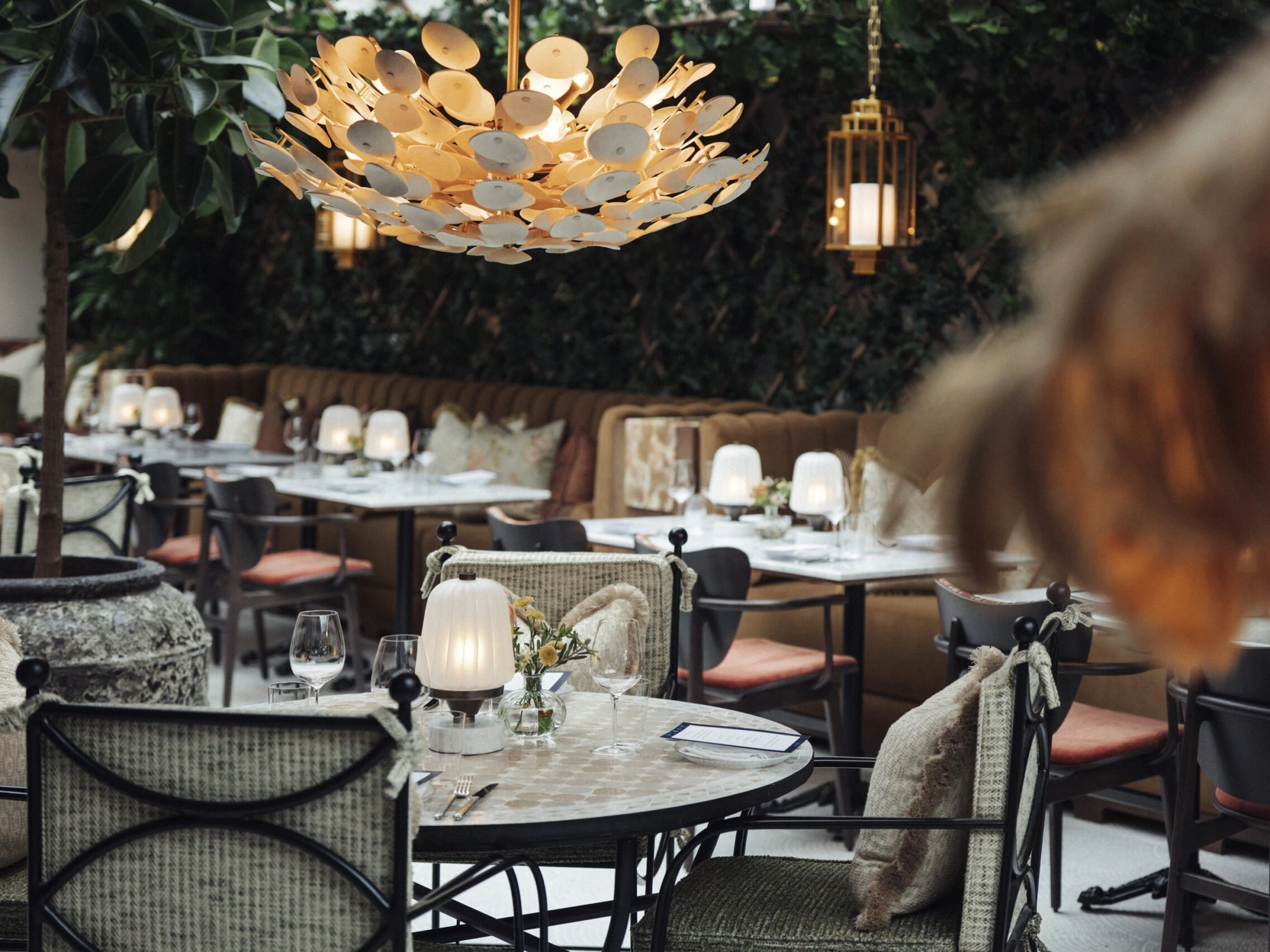 Interior and exterior views of the members&rsquo; club Villa Pauli in Djursholm, including the restaurant St. Nobl, the bar, the spa and gym, the pool terrace and a guest suite.