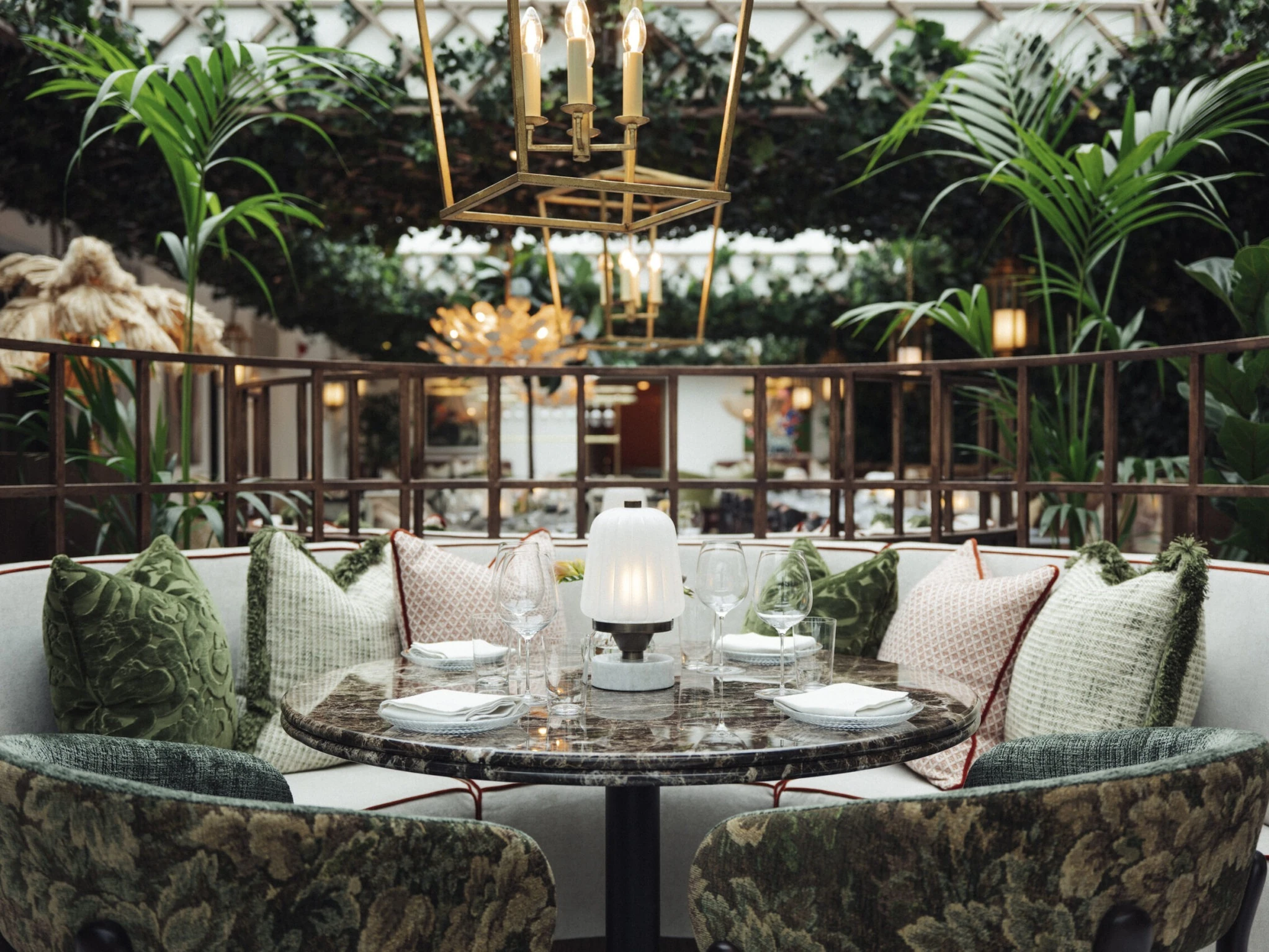 Interior and exterior views of the members&rsquo; club Villa Pauli in Djursholm, including the restaurant St. Nobl, the bar, the spa and gym, the pool terrace and a guest suite.