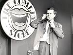Jack Dee on stage at the Comedy Store