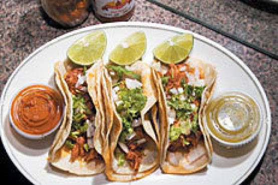 Carnitas tacos at Tehuitzingo Deli and Grocery