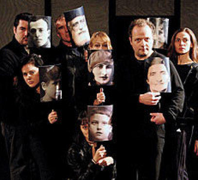 FACE THE MUSIC The chorus tunefully commemorates the dead.