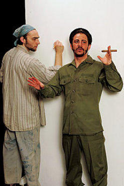 POLITICAL POSER Schulman, right, is etched by Smith.