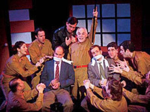 CAPTIVE AUDIENCE Stanley, center, shanghais a pair of Broadway tunesmiths.