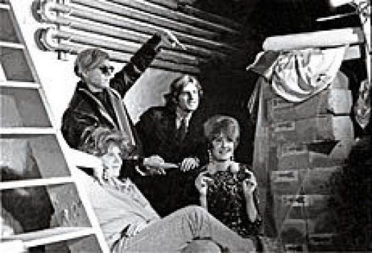 DANDY WARHOL The artist poses with his posse at the Factory in 1967.