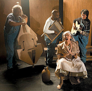 DELTA FORCE Blues belter Dabney, front, sings like hell.