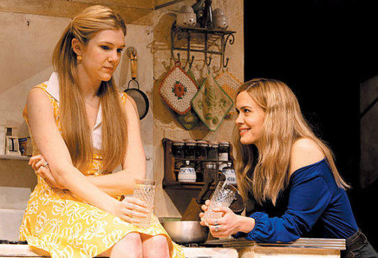 GOSSIP GIRLS Rabe, left, dishes with sis Paulson.