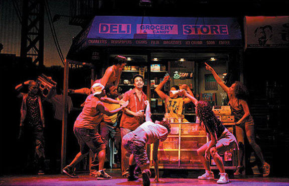 NEW DELI Bodega owner Miranda, center, gives fresh life to Broadway.