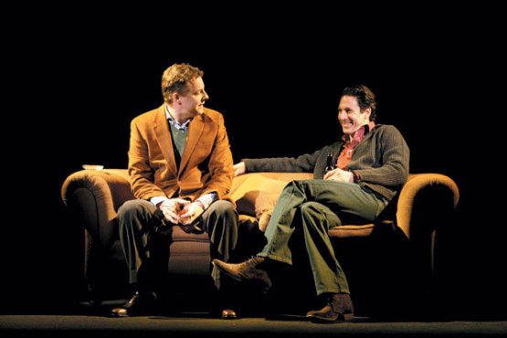 COUCHED TERMS West, left, trades words with Cohen.