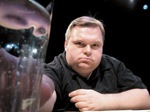 IN THE DRINK The monologuist wets his whistle.