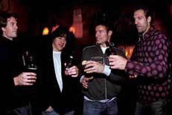 RANGERS IN THE NIGHT Strudwick, Ortmeyer, Moore and Rucchin, from left, say cheers.