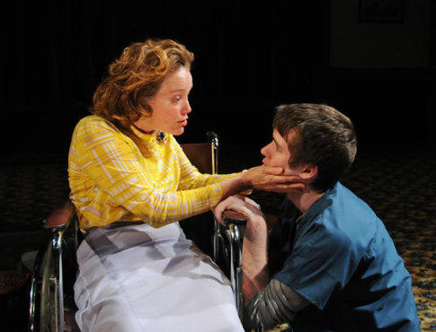 ON A ROLL Wheelchair-bound Griffith, left, comforts Murray.
