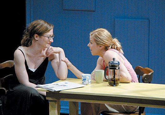 COFFEE AND SYMPATHY McNamara, left, gets love advice from Eskelson.