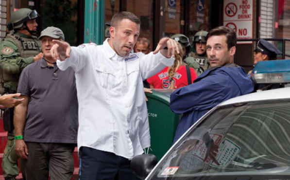 BEN THERE, DO THAT Affleck, center, offers Jon Hamm, right, a few Bostonian tips.