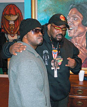 UNIVERSAL MC The message of dignity coming from NYOIL, left, with supporter Afrika Bambaataa, is aimed at Black America, but it applies to everyone.