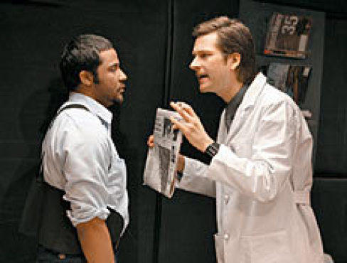 READ ALL ABOUT IT Dirden, left, gets the news from Stas May.