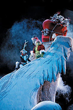 CLIFF HANGER Page, right, and accomplice Rusty Ross do away with a sleighful of gifts.