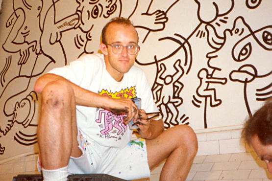 Keith Haring with his Once Upon A Time mural at the LGBT Center