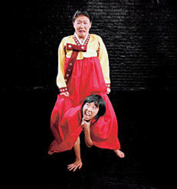 UNDER WHERE? Yamamoto, bottom, gives Lim a fright.