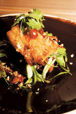 Braised pork belly with cilantro, mint and caramel glaze