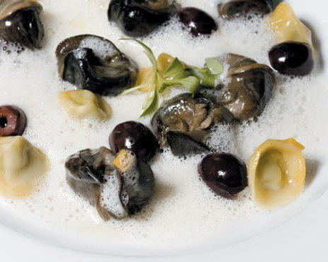 Escargots with capers, olives, grapes and ravioli