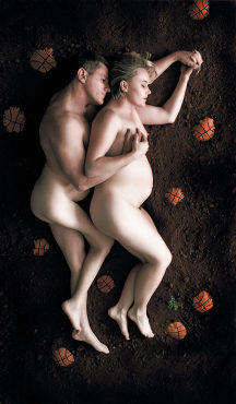 PREGNANT PAUSE Gold-medal Paralympian Gerry Hewson poses with his wife, Louise.