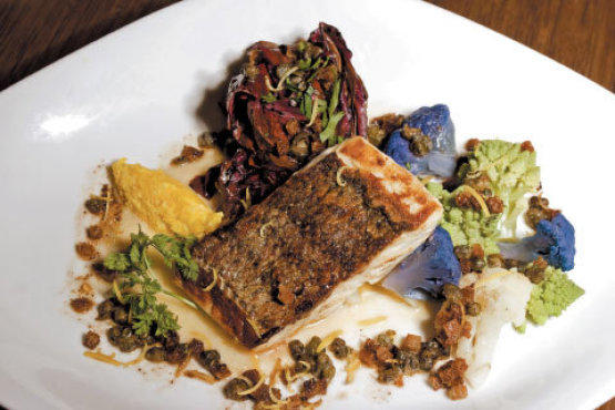 Striped bass meunire with fried capers and seasonal vegetables