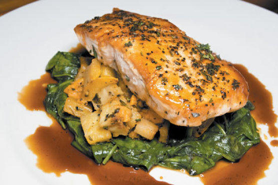 Pan-seared salmon with pomegranate glaze at River Barrel
