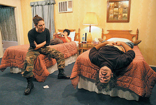 MOTEL HATE Pohly, left, spews venom in a cheap room.