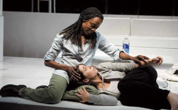 COLOR CODED Woodard, left, comforts an alienated Milioti.