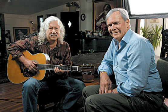 Arlo Guthrie, left, reminisces with Tom Brokaw