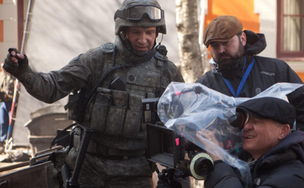 Actor-director Ralph Fiennes, left, on the set of Coriolanus