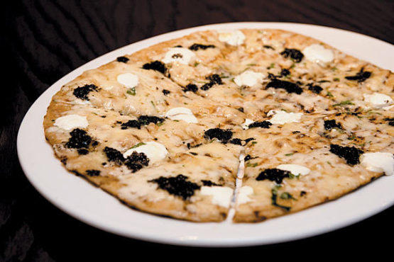 Robiola and black-truffle pizza