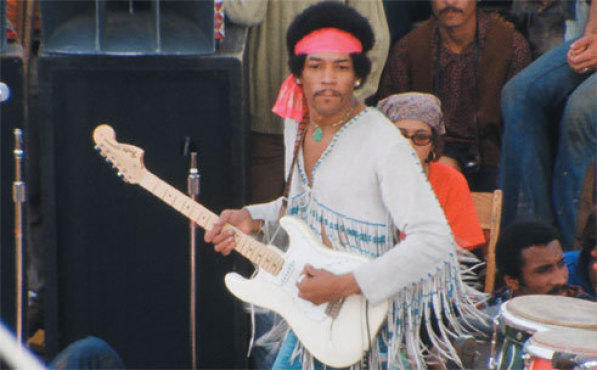 FRINGE BENEFITS Hendrix models a cool jacket, plays some hot licks
