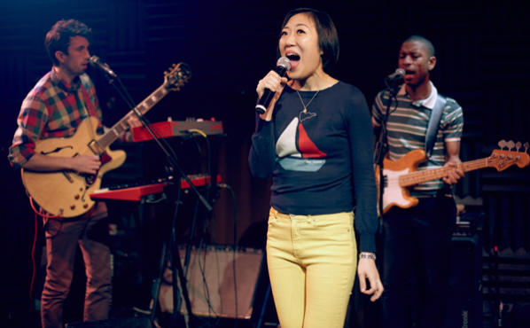 TUNED IN Lee, center, hits a high note with her band.